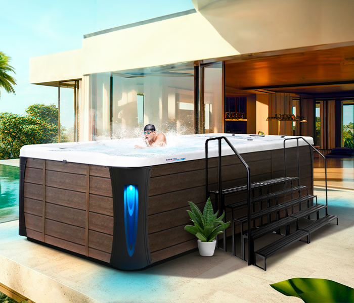 Calspas hot tub being used in a family setting - Naples